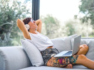 woman sitting on couch