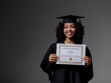 woman holding a diploma